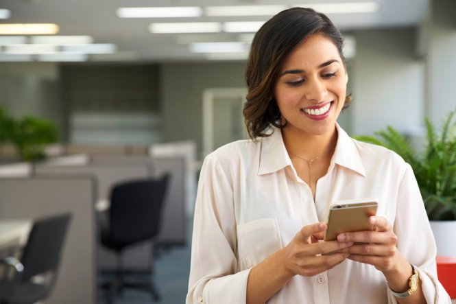 A woman using a smartphone.