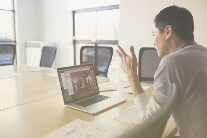 A man holding a video conference on his laptop, learning how to improve external communication.