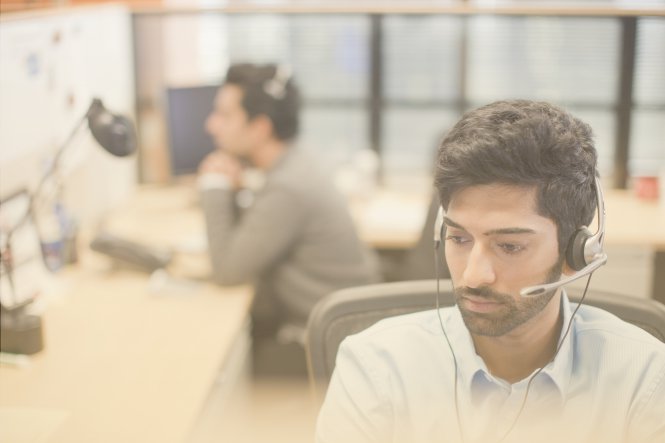 An employee providing contact center services over the phone.
