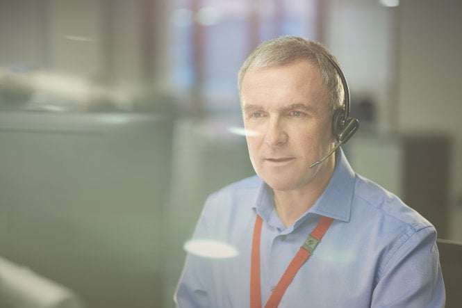 Man ensures customers and co-workers get an excellent contact center experience.