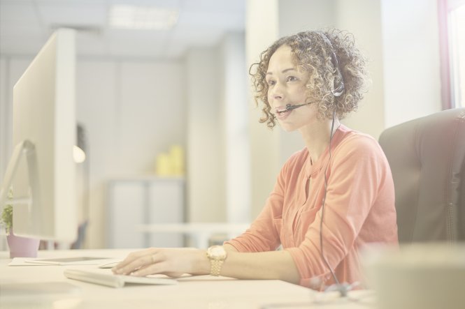 A Contact center-as-a-service agent takes a phone call.