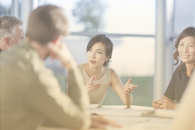 Business leaders meet with a potential CPaaS provider.