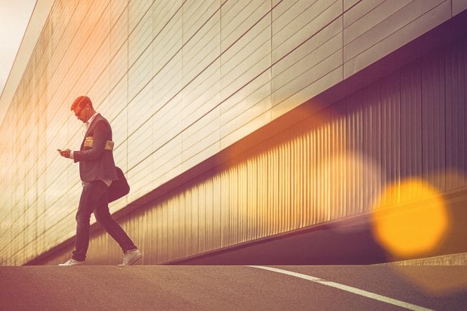 Businessman utilizing the advantages of 5G technology on the go.