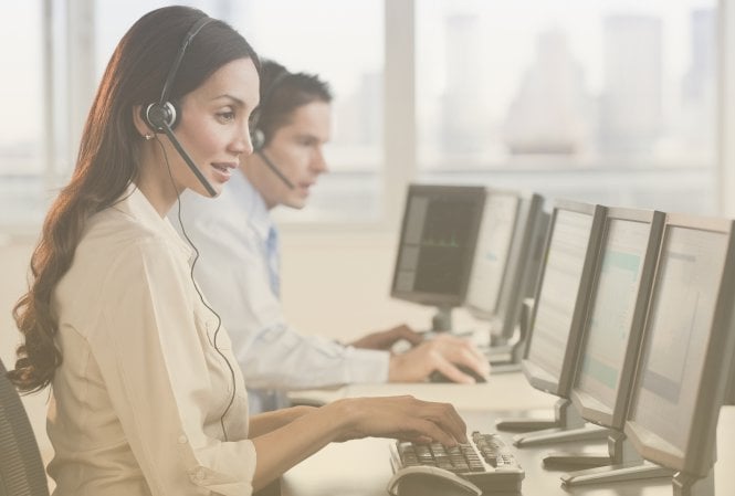 Two customer care specialists working in a social media contact center