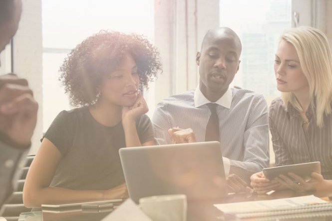 Team members considering the roles needed to implement a cloud strategy