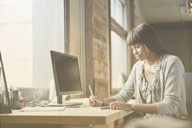 Employee working from home as part of her company's policy on work from home jobs