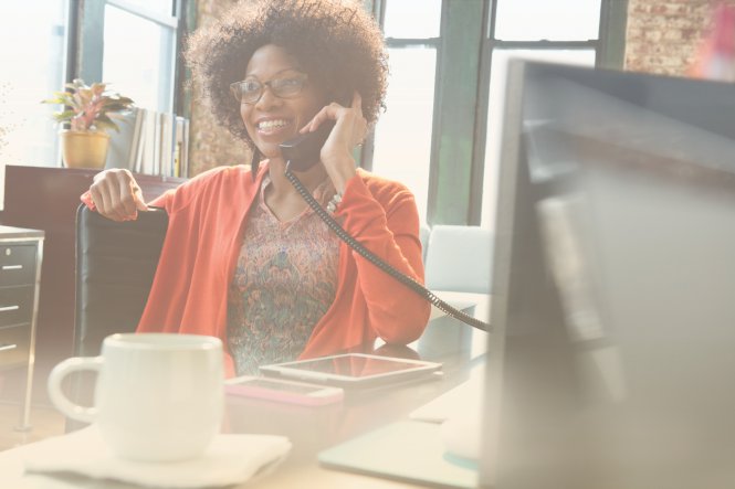 Woman telecommuting from home based on her company's work from home policy