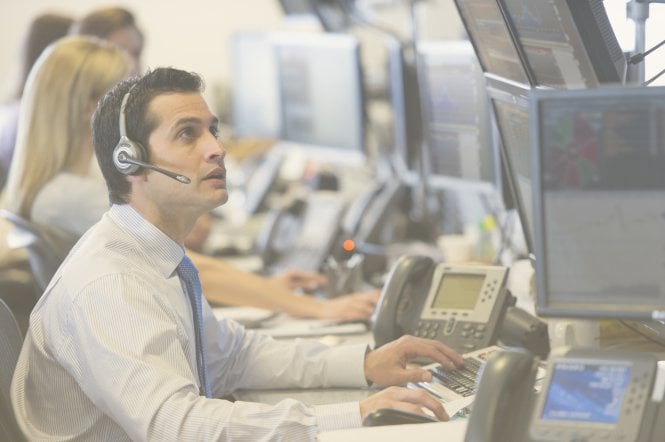 Employee at a finance firm using unified communications to improve work productivity