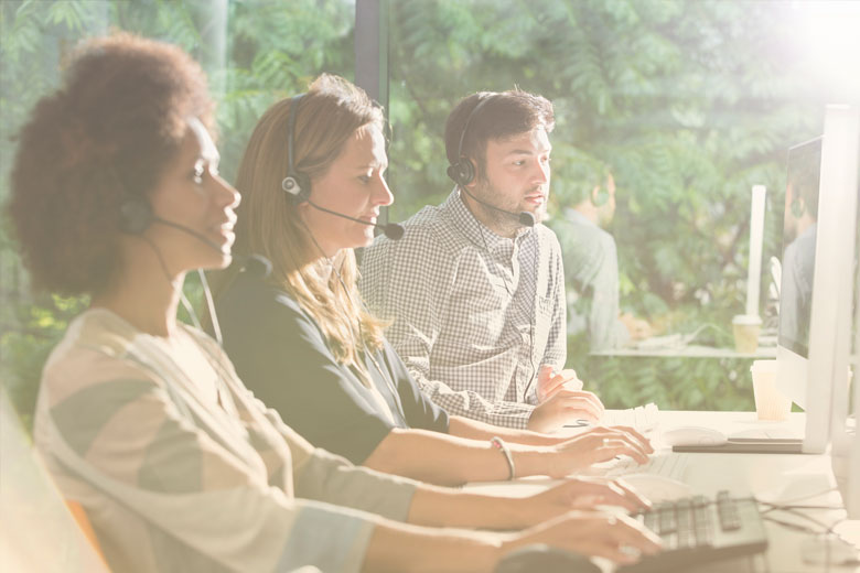 Contact center employees using UCaaS technology to provide customer service
