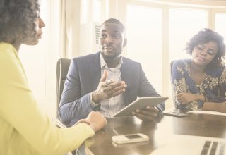 An insurance company executive using new cloud technologies to provide a better customer experience.