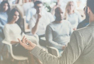 Professor teaching in a classroom influenced by digital transformation