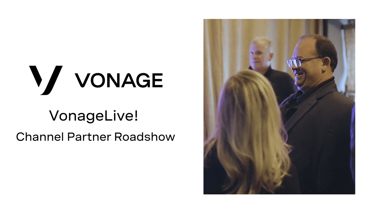 Video frame with the Vonage logo and the words "Vonage Live! Channel Partner Roadshow” and a photo of a group of people