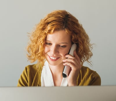  Businesswoman Speaking On The Phone At The Office