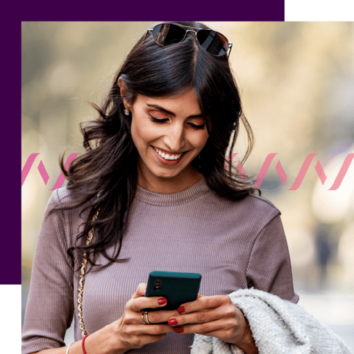 Own Your Brand infographic image Photo of a woman looking at a mobile phone and smiling