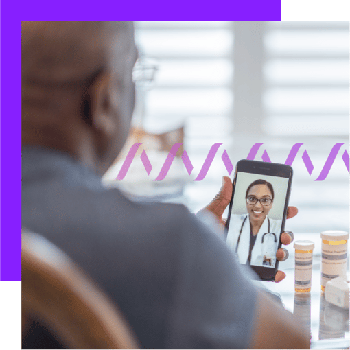 Vonage HIPAA Compliance whitepaper in-line image Photoillustration of a man holding a cell phone with a female doctor on-screen; she is wearing glasses, a white lab coat, and a stethoscope; next to the phone are 2 pill bottles