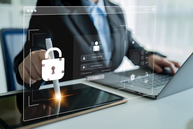 Modern Businessman Using Digital Tablet for Secure Online Login with Cybersecurity Concepts and Innovative Technology in Office Environment - stock photo