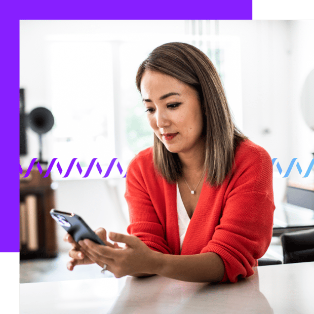 Photo of a woman looking at her cell phone and texting. In the background, a series of small purple waveforms runs across the frame.