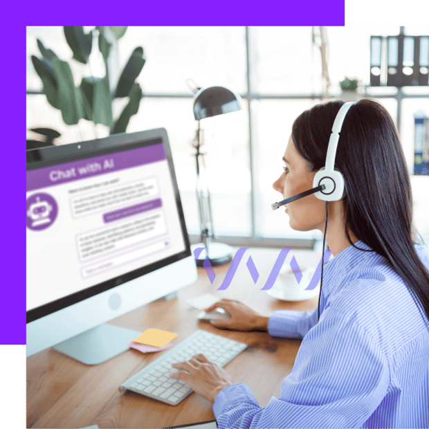 Photo of a female contact center agent wearing a headset and work at her computer in an office setting. The information on the monitor is blurred.