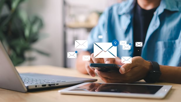 photo of laptop, smartphone, and tablet; with email images