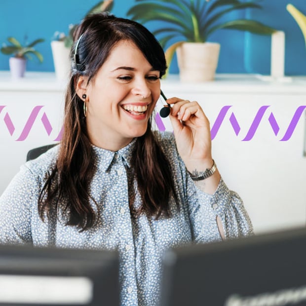 UC SEO Customer Communications Blog Header Photo of smiling agent talking to a customer through her headset. In the background, a series of small purple waves run across the frame, representing communications