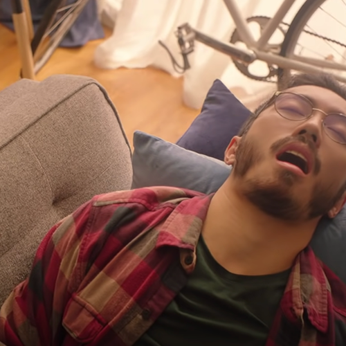 Vonage does that cart retargeting video thumbnail Man on couch sleeping with mouth open